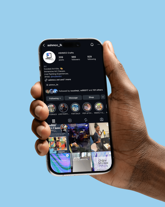 Hand holding a smartphone displaying a social media app on a blue background