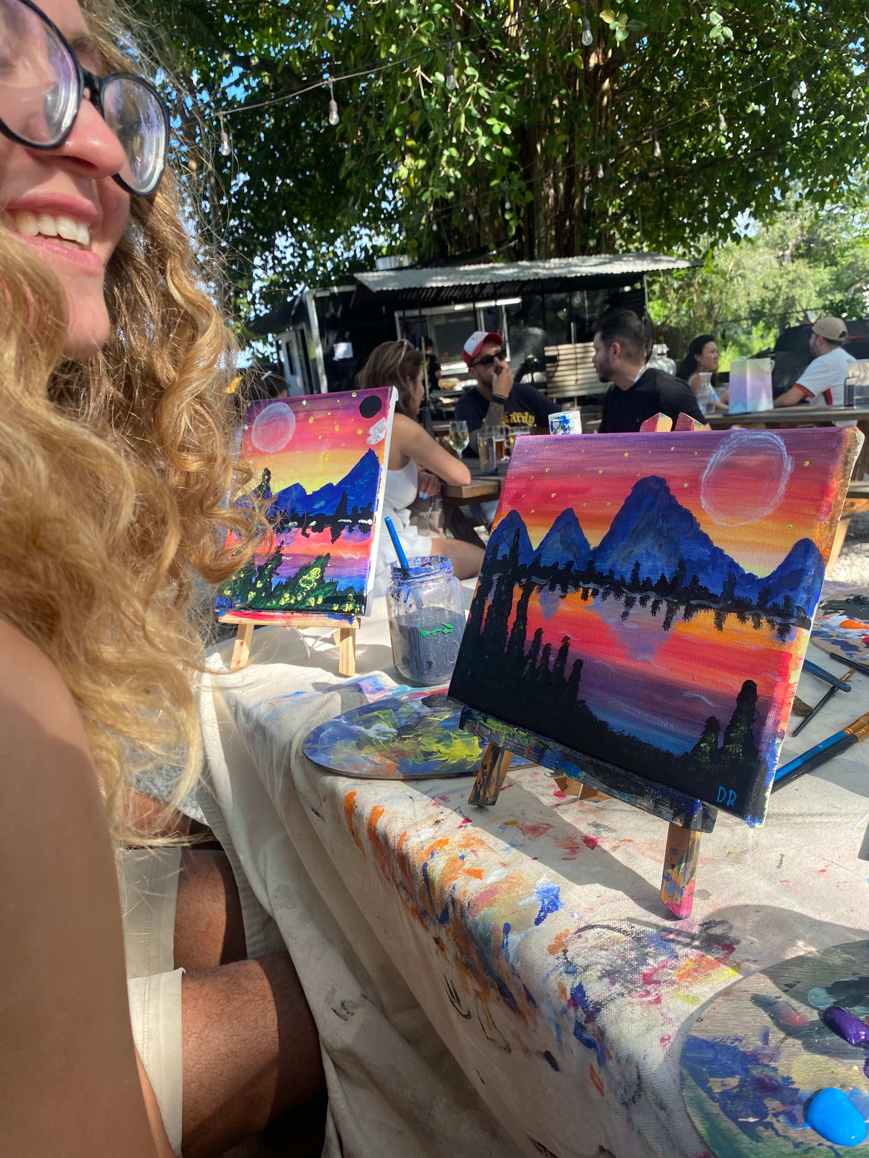Happy Student painting Mountain Sunset at acrylic painting Art class Sunday at Magic 3 brewing
